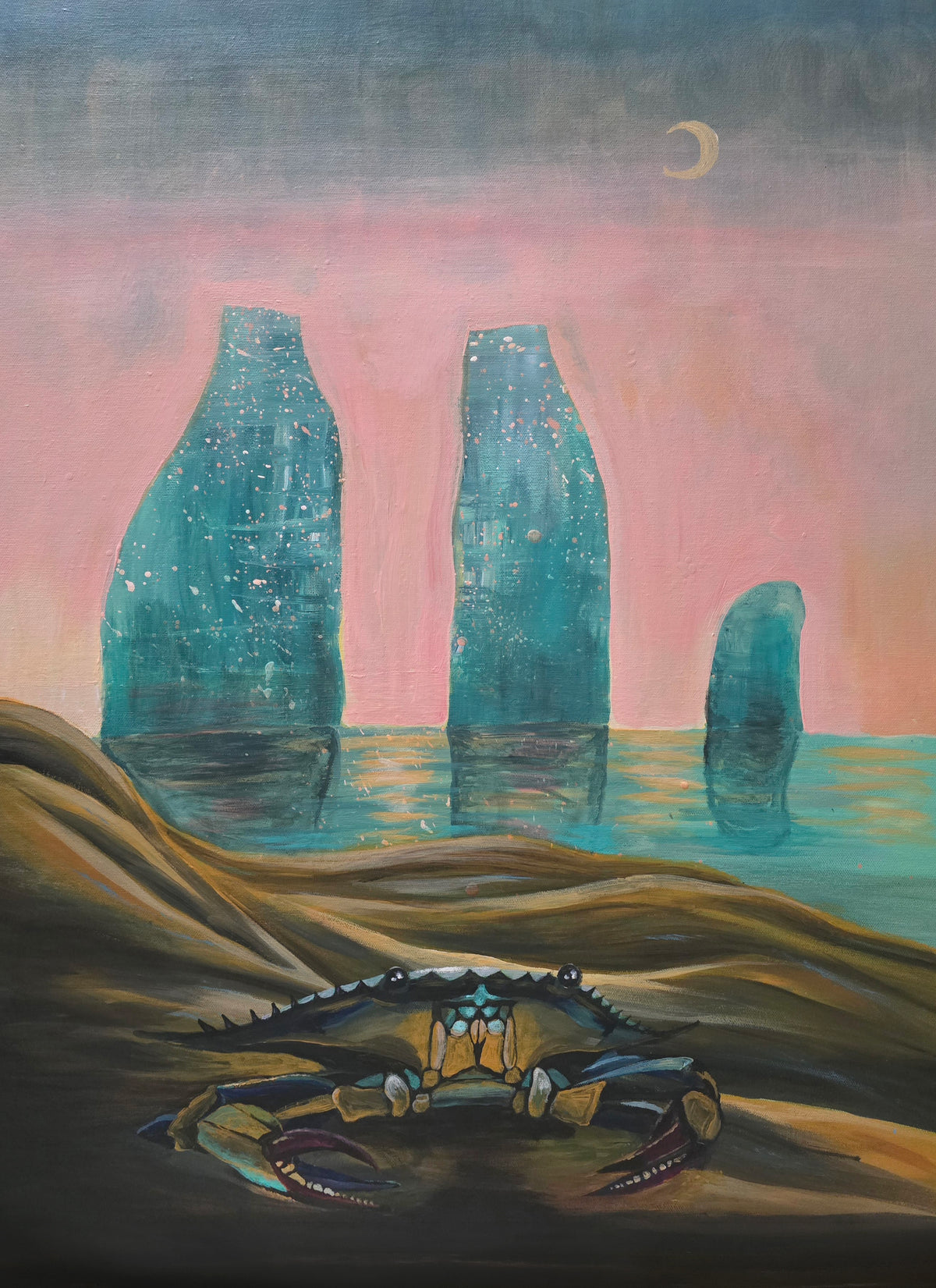 A surreal painting of a blue crab on sandy ground in the foreground, with three tall blue rock formations rising from turquoise water under a pink sky and a small crescent moon.